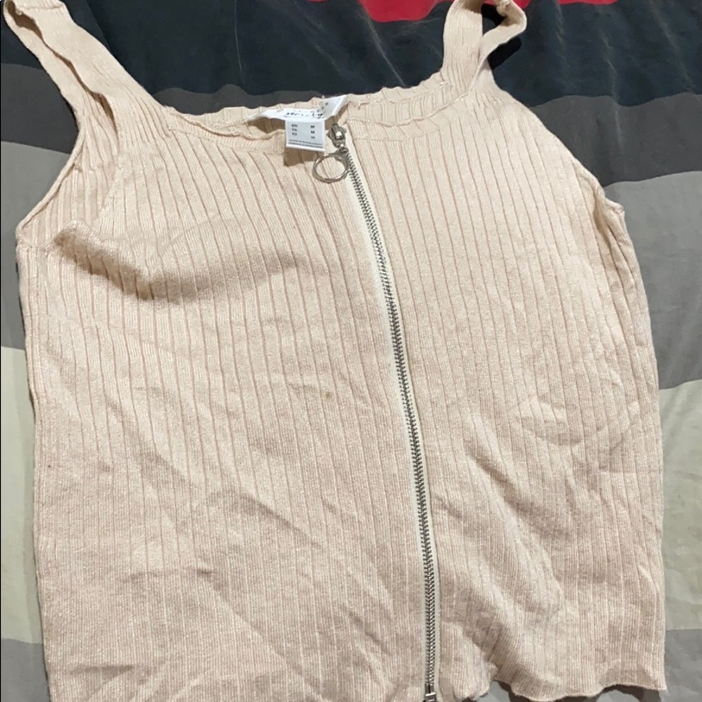 Zipper tank